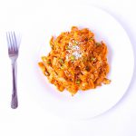 Fettuccine pasta in roasted tomato and onion sauce.